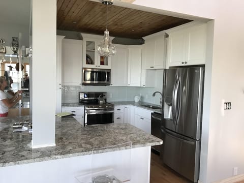 Kitchen with all new appliances, cabinets, and granite countertops