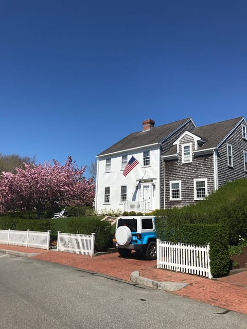 View from the street with single car parking 