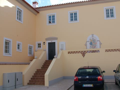 Front of house and allocated parking spaces