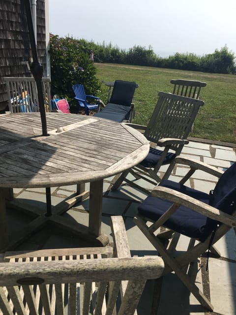 Protected front patio with ocean view