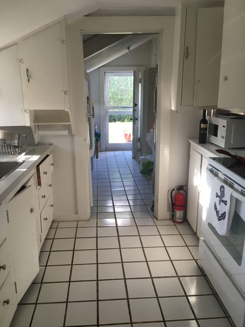 Kitchen with washer/dryer area attached
