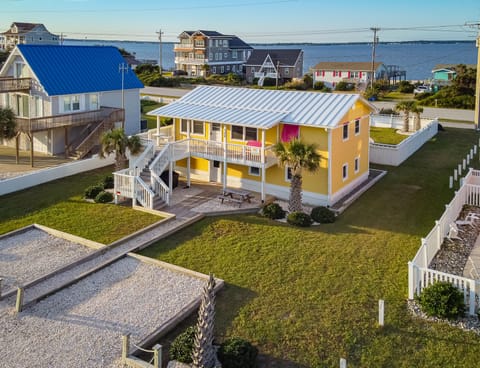 Beautiful beach house with palm trees directly across from the Beach Access.