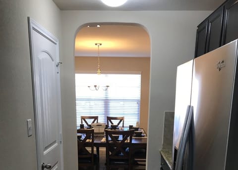 Convenient dining room seating 8 just off the kitchen