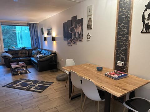 Living and dining area with outdoor view