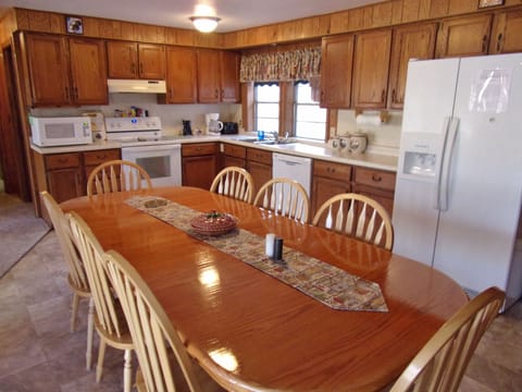 The kitchen is spacious and well appointed for serving large groups. 