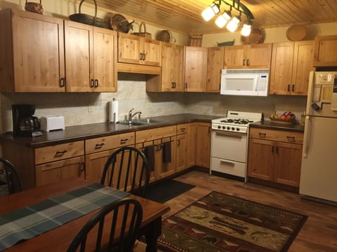 Kitchen is fresh and modern complete with a Keurig!