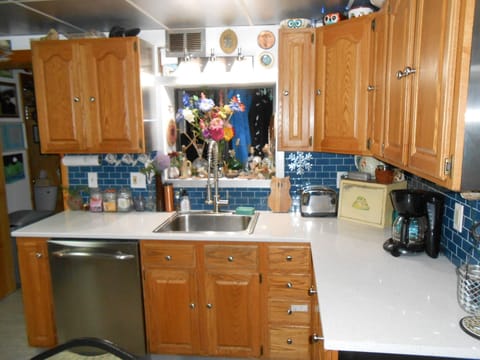 Coffee maker, toaster, dishwasher, dishes and utensils for everything