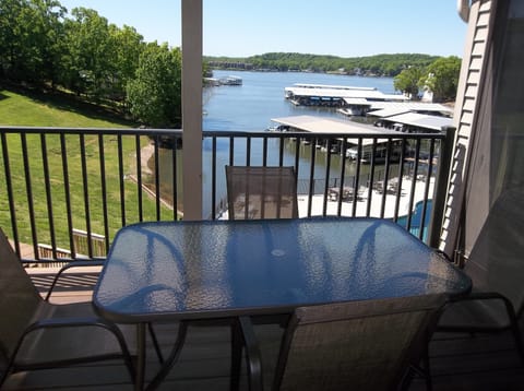 Wonderful view of the lake, pool and hot tub from your balcony!