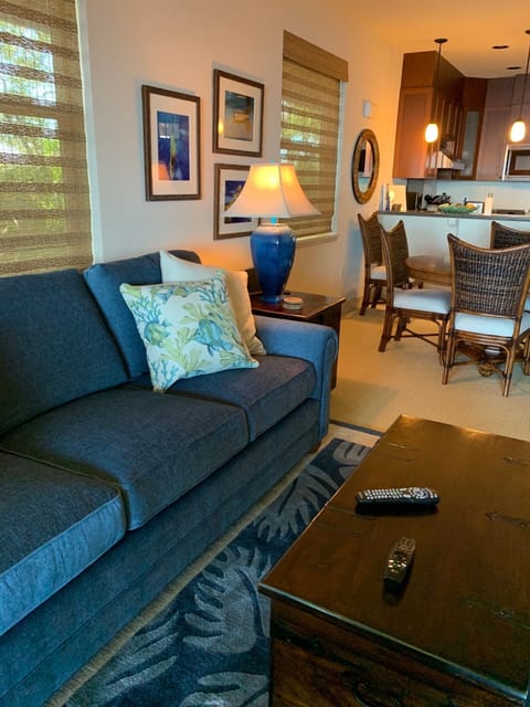 Ideal floor plan with open concept kitchen to living room to lanai beyond. Brand New couch and dining table (August 2020); the owners aim to provide a comfortable and fresh experience for their guests!!