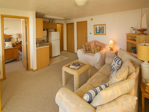 Upper level oceanfront Master bedroom living room and kitchenette.