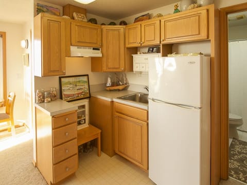 Upper level kitchenette, offering additional refrigerator 