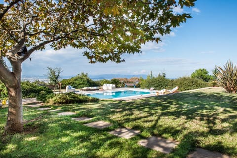 Villa Mariposa - Private spacious pool area with panoramic sea and city view.
