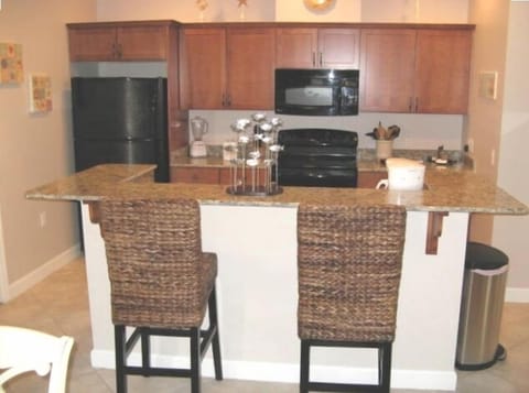 Kitchen counter area that seats three(3) at the counter for extra eating area