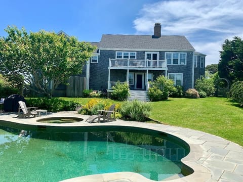 Backyard with pool, spa, and pool house! 