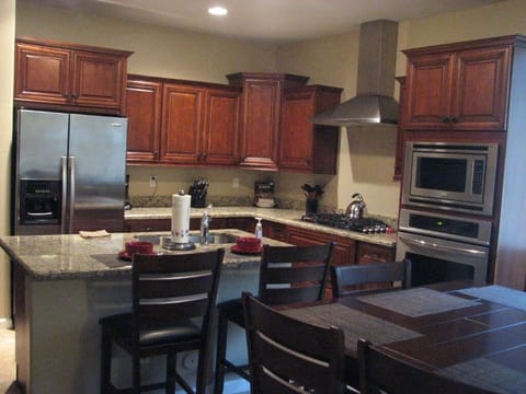 Granite countertops and stainless steel appliances
