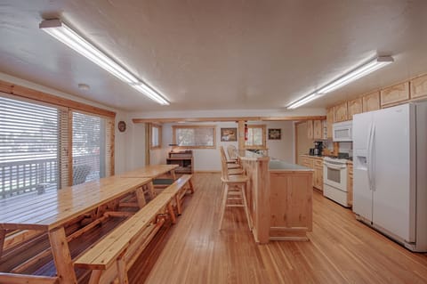 Large dining area with fully stocked kitchen