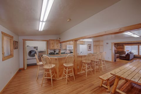 Private washer and dryer room adjacent to kitchen