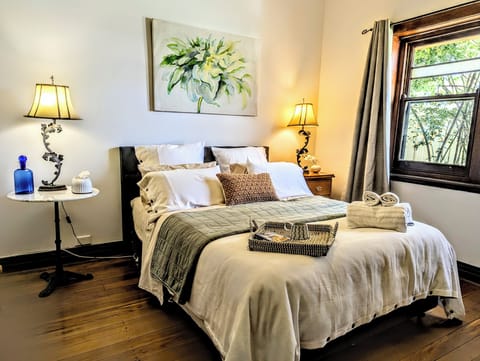 Main Bedroom, Queen size bed, ducted aircon and overhead fan
