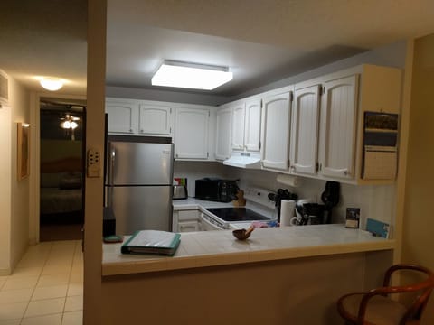 Updated kitchen with stainless fridge and dishwasher.