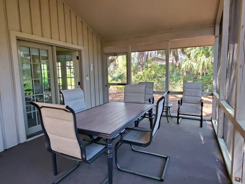 The spacious Screen Porch at 4 Cedar Wax Wing is located just off the main living area