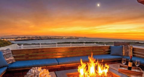 Gather around the ocean front fire pit 