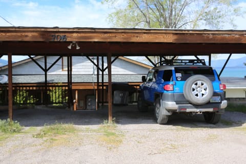 Private carport parking in back.