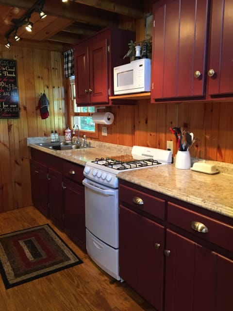 Gas Stove and oven with a microwave above