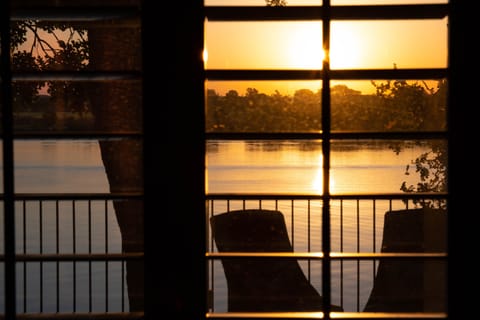 View of the lake and top deck from the livingroom window