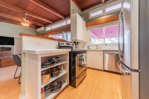 Kitchen with refrigerator, stove, and dishwasher.