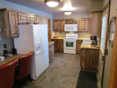 Kitchen:  Remodeled in 2011; new appliances, quartz countertops, fully furnished