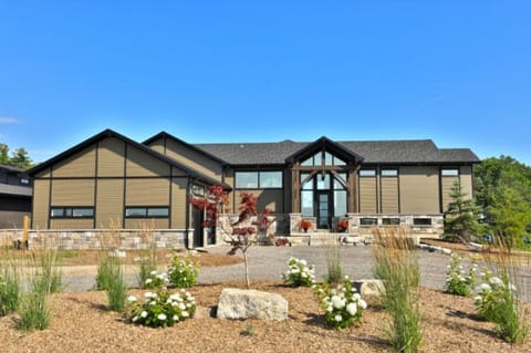 two car garage with lots of driveway parking