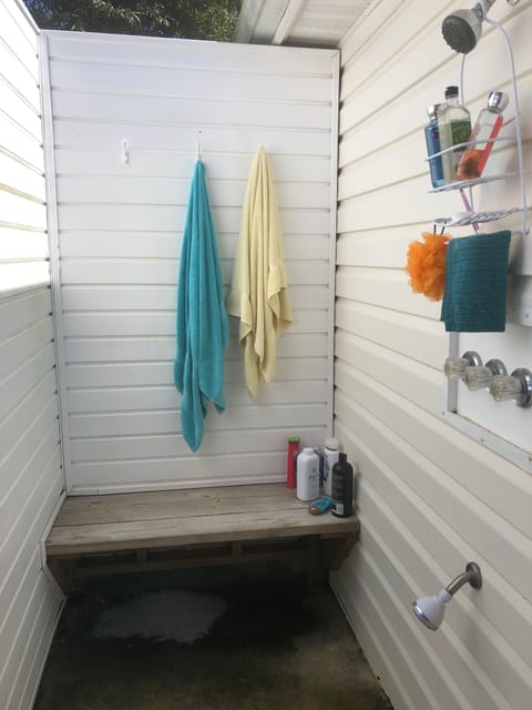 Outdoor shower with hot and cold water.