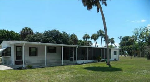 exterior with large yard and lots of boat parking