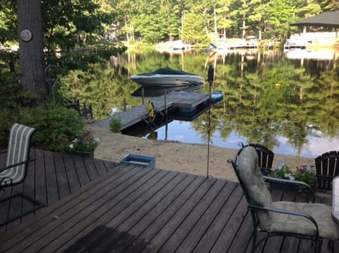 Private sandy beach with dock & large deck