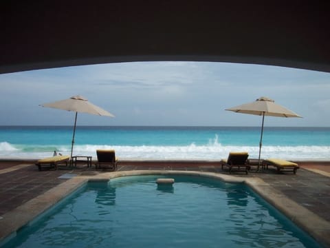 View from the outisde living room to the private pool