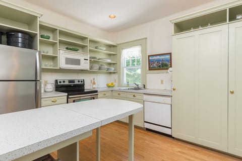 the second kitchen is fully equipped with a second oven dishwasher, refrigerator