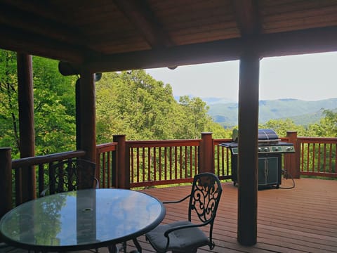 Now enclosed porch,  gas grill, and fabulous view