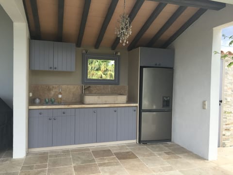 Outdoor kitchen with fridge and freezer for cold drinks and icecreams
