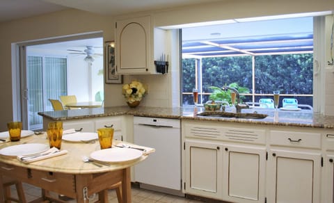 Kitchen pass-through to pool side counter