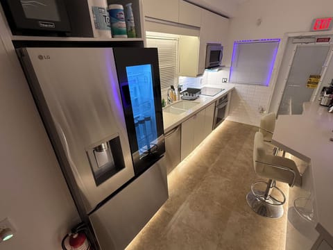 XXL Size 31 cu. ft. InstaView Smart Refrigerator Access kitchen to direct garage