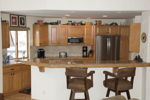 Gourmet kitchen with panoramic mountain views