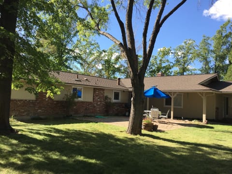 Exterior view 3 view from backyard toward front door.