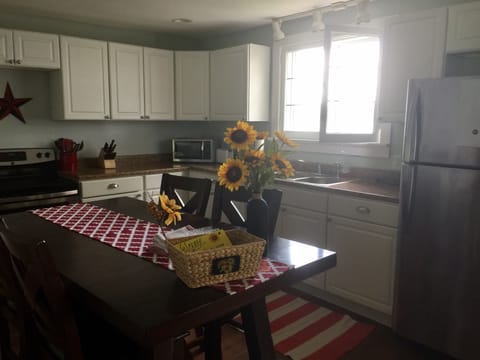 Lovely Summer Breeze and peaceful lake sounds waft in through the many windows!