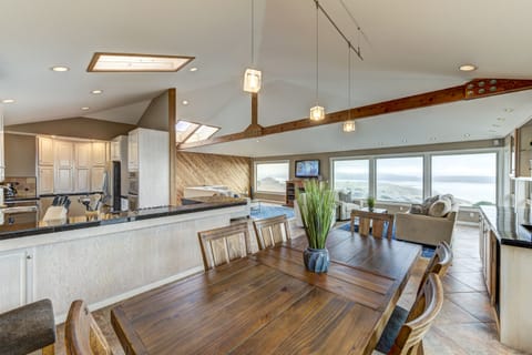 Open, bright plan through kitchen, dining room and living room