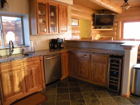 Kitchen, breakfast counter and backside is dining. 
