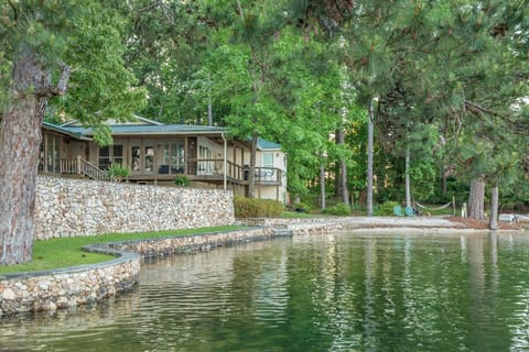 Rock wall and beach from pier in late spring, summer, and early fall