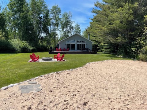 Outdoor Firepit & Sandy Beach with Gradual Entry into the Lake. 