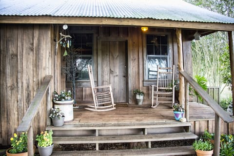 Relax on the front porch and let the breeze blow the hustle of the cityfar away