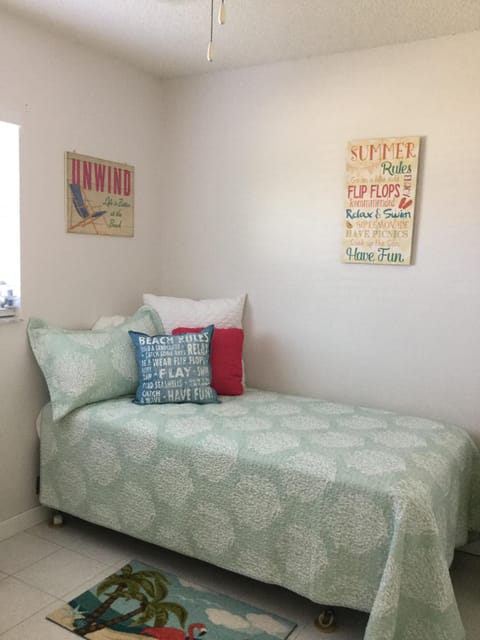 view of right side of twin bed guest room