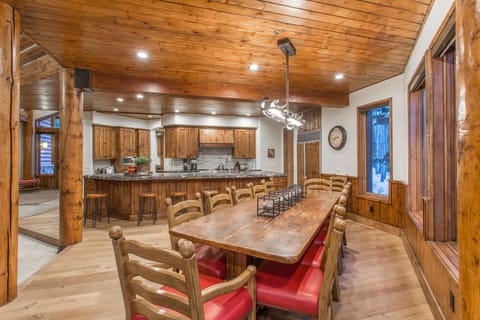 Dining table seats 12; can squeeze 14 with two on each end